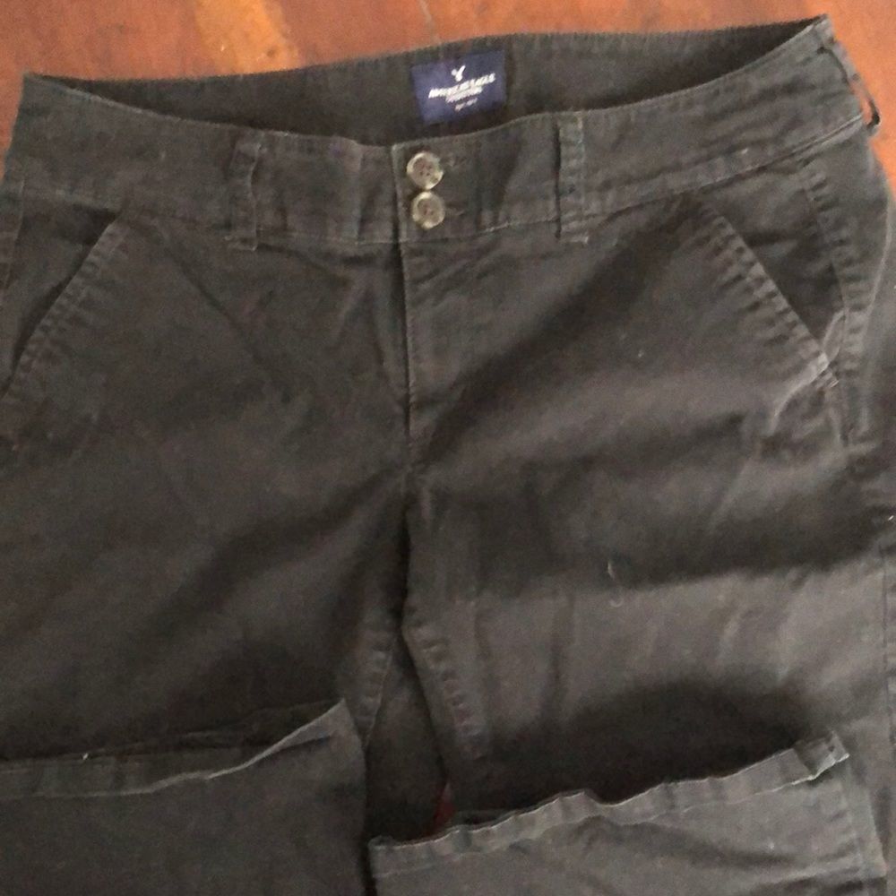 American Eagle black Artist jeans sz 8/. 4 pockets /front zipper /2 buttons EUC